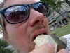 Enjoying a fantastically large Argentinean cookie in Mayo Square outside the Pink Palace, Buenos Aires.