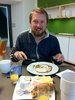 Tom gets his birthday breakfast from a small town in Austria called Hartberg where we stayed last night to shelter from the downpour.
