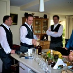 The boys - mostly ready - prepare the whiskey