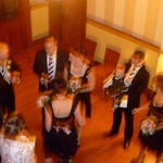The guests start to mingle downstairs for canapes and cocktails