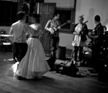 As the band sets up in the background