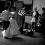 As the band sets up in the background