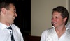 Paul and Tom share a joke?