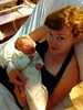 Happy an content with Mum, only 9 hours old.