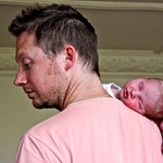 Snoozing on Dad - usually the burp position!