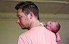Snoozing on Dad - usually the burp position!