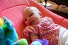 The cutest flower outfit around, beginning to smile