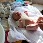 Bath time on the table, 6 weeks old