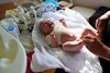 Bath time on the table, 6 weeks old