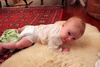Tummy time by the heater, 8 weeks old