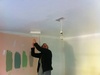 While the painting in the office continues