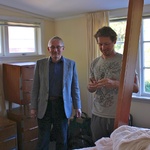 Alan helps construct our bed at Sunshine Ave.