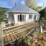 The bearers and the joists go down.