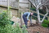 Soil goes into the retaining wall