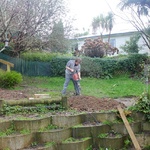 Jack hammering out the concrete slab where the washing line used to be