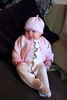 Looking pretty in a new outfit made by Nan. Who turned out the lights!?!