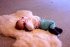 This morning Olive wiggled a 180 off the sheepskin to get a better look at the fire.