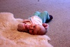 This morning Olive wiggled a 180 off the sheepskin to get a better look at the fire.