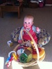 I'm a big girl now! Sitting up and choosing my toys!