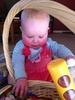 I'm a big girl now! Sitting up and choosing my toys!