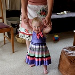 The birthday girl, in her party dress