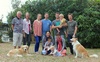 The extended Peck family. Difficult to choreograph with 3 little ones and two dogs!