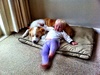 Olive just adores her big fur brother, especially on his bed and his nose. Lying backwards on him is cuddling too.