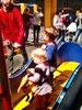 Fishing for ducks, looking in mirrors, playing cafe, digging for balls at science museum in Melbourne.