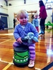Riding around the hall at gym jam with Vincent.