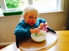 It took duck with a bib to get Olive into her chair for breakfast.