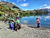 Throwing stones after a lovely walk at Lake Wanaka.