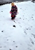 Olives first steps on snow. She was a little apprehensive at first. When asked about the snow later she points to her feet and says 