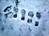 Olives first steps on snow. She was a little apprehensive at first. When asked about the snow later she points to her feet and says 