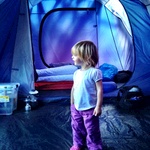 Violet checking out our tent