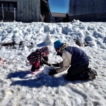 Making her first snowman
