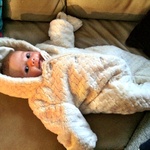 Trying on Olives bear outfit