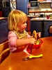 She may not always use her fork but when M&D had chopsticks, she just had to have some! She proved us wrong, and managed to eat a lot of her noodle dish with her sticks! I wonder how Asian kids learn to use chopsticks?
