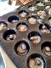 Flying 12 hours solo! We had a ball. One of the twelve hours: Iris slept under the gym and olive and I made muffins. Olive is getting a lot better at sifting flour and was really careful with spooning out the mixture. A blueberry for each muffin!