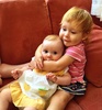 Iris got lots of cuddles from Milla and Lachlan while on holiday.