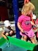 The sun is back! My big two year old all painted black and blue after fun in the water and sun at Playcentre. Painting animals and mixing paint and water was fun. The backpack is a huge hit too.