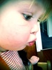 The famous jewjew lips. They seem to pop out when Olive is in deep concentration. She loved painting Iris's letters and then beer boxes this morning.