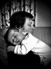 Cuddles with mummy and daddy.
