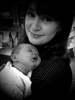 Cuddles with mummy and daddy.