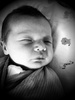 The 'Pretend I'm sleeping face' only to cry after we stop rocking.