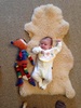 5 weeks old! Weighted in at 4.11kg. It seems everyone wanted to be in in the photo! Even iris's new soft friend fletch the fox.
