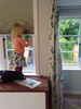 They have arrived! And Olive took it upon herself after the 'blind man' had left to try and put it down from on top of the cabinet. Olive's little chairs seem to scattered all over the house these days as she uses them to get to anything up high.