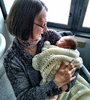 Granny and Grandpa come to meet and hold little Iris. Tag: Pixel