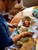 Iris' first bath! A bit of a shock to her sleepy system.