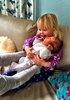Olives occasional interest in her little sister has led to cuddles, kisses a few pokes and the sharing of baby toys. She seems to be warming up to the idea of having a sibling and apparently has been taking about her baby Iris at playgroup.