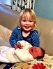 Olives occasional interest in her little sister has led to cuddles, kisses a few pokes and the sharing of baby toys. She seems to be warming up to the idea of having a sibling and apparently has been taking about her baby Iris at playgroup.